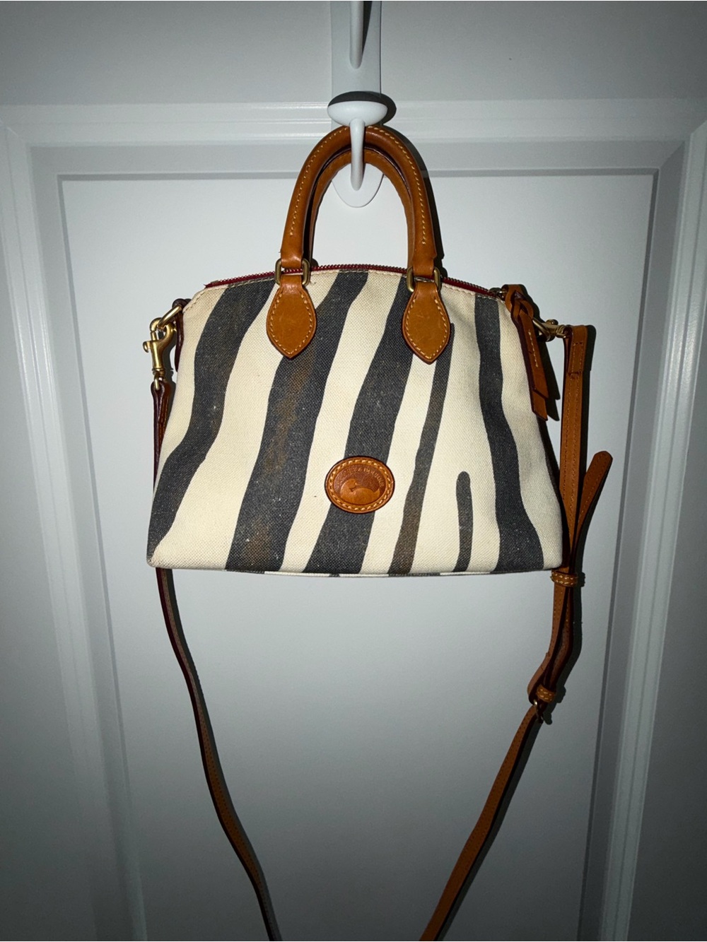 Dooney & Bourke Black and Cream Zebra-Print Crossbody Satchel with Tan Trim